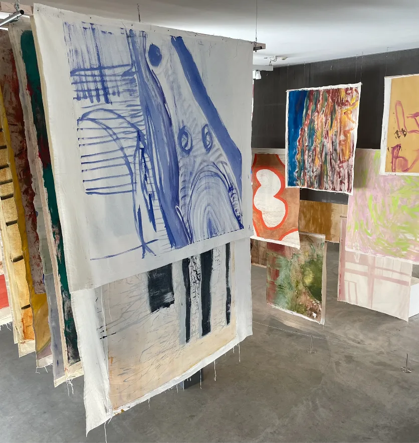 Vivian Suter’s canvases on display in “Like Water” at the Contemporary Art Museum St. Louis.