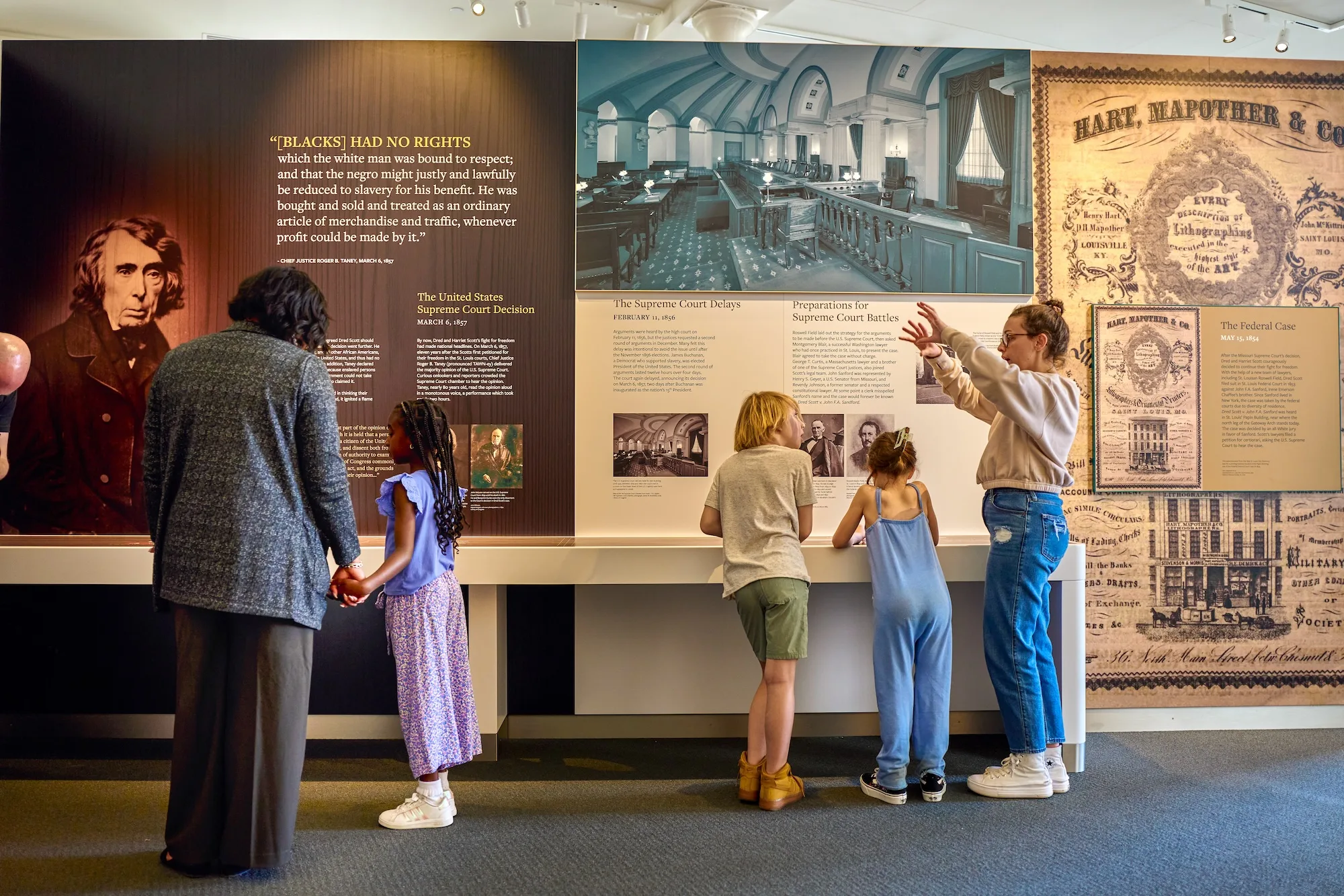 Families explore the new exhibits at St. Louis' Old Courthouse.