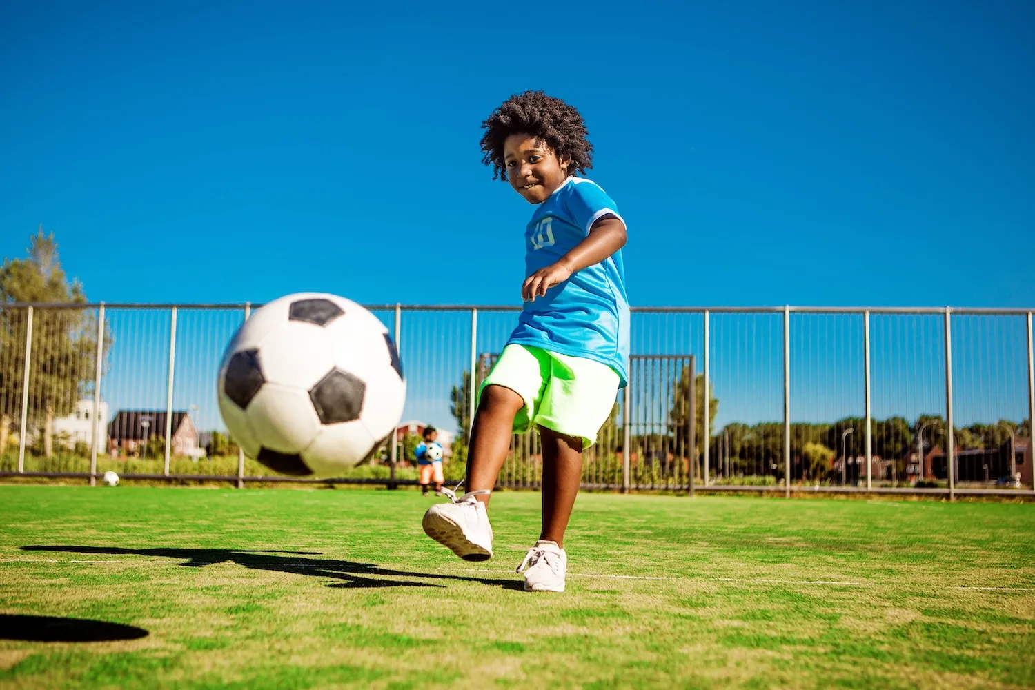 kid playing soccer