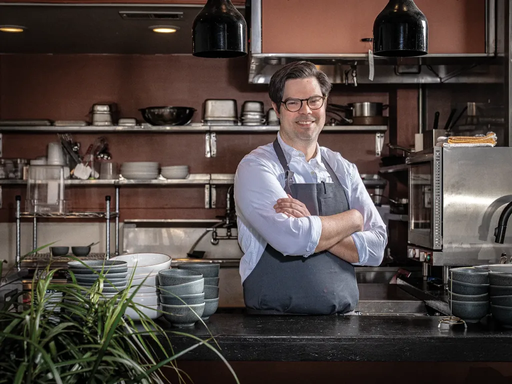 Chef Alec Schingel in the kitchen at Robin Restaurant in downtown Maplewood.