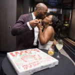 Lauren and Marcus Lee eat Imo's Pizza on their wedding night.