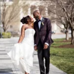 Lauren and Marcus Lee on their wedding day in front of the Old Courthouse