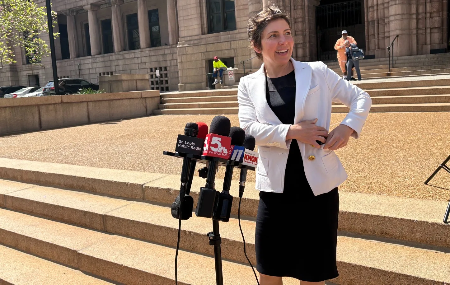 Mayor-elect Cara Spencer talks to the media on the steps of St. Louis City Hall.