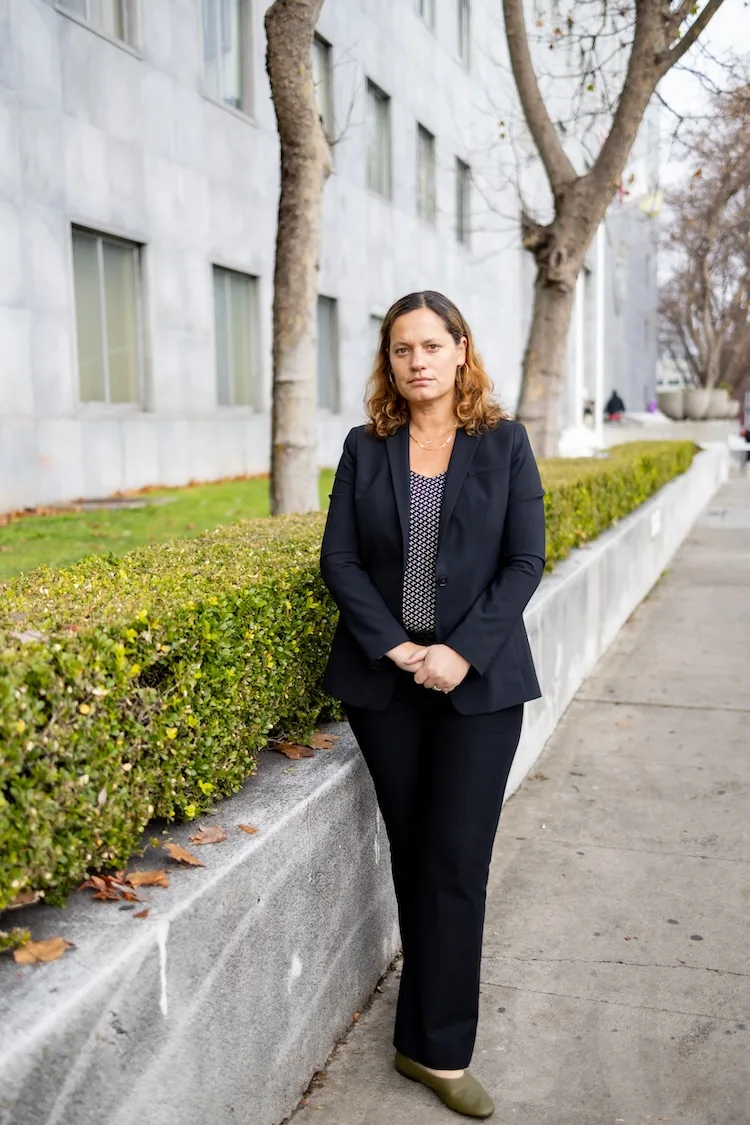 Kate Weisburd, professor of law at UC Law San Francisco, in front of the Hall of Justice in San Francisco, California.