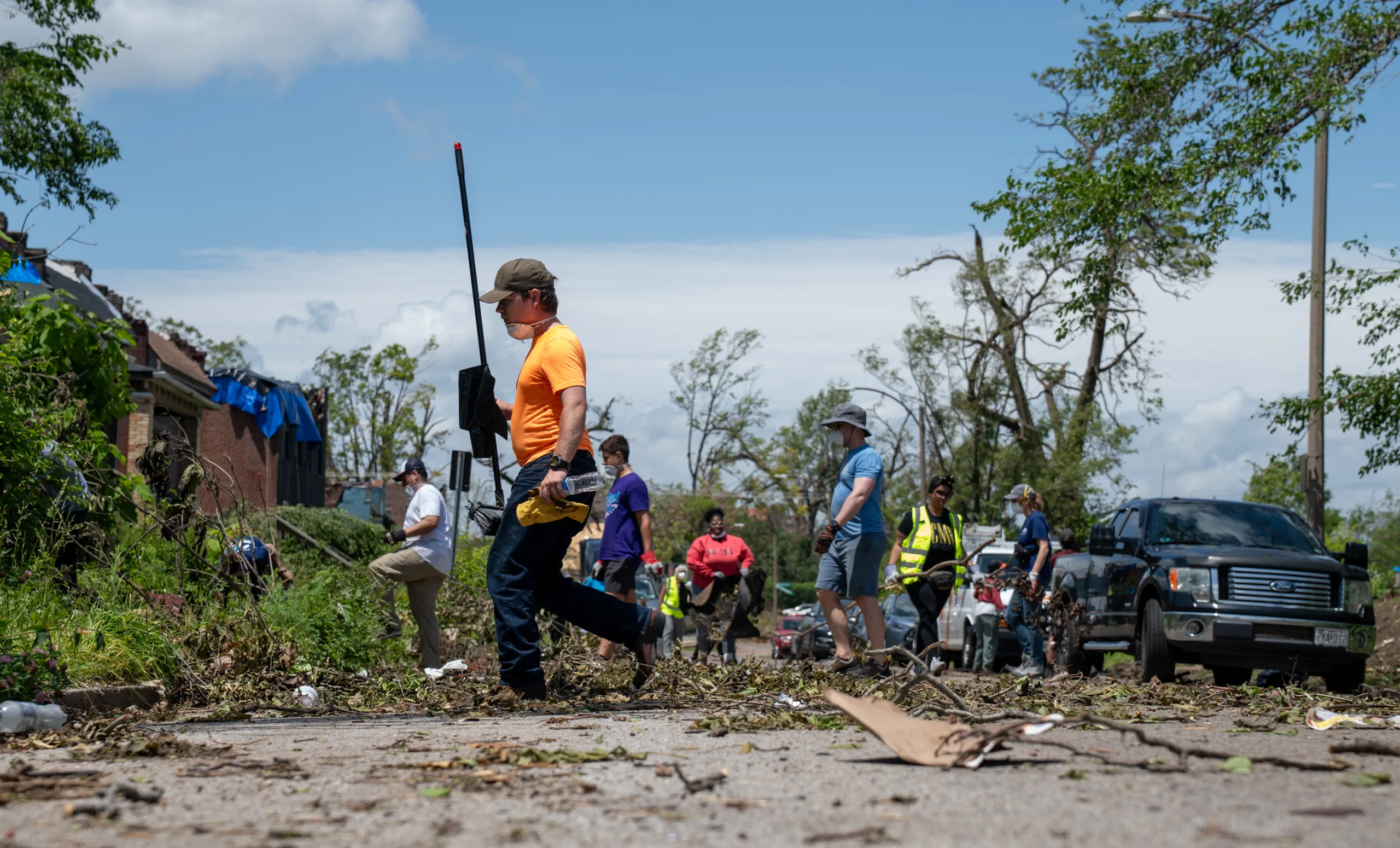 Volunteers clearing debris.