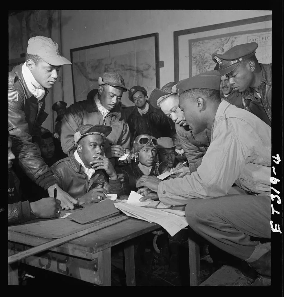 Tuskegee airmen at a briefing at Ramitelli, Italy, March 1945. Photograph by Toni Frissell, Library of Congress Prints and Photographs.