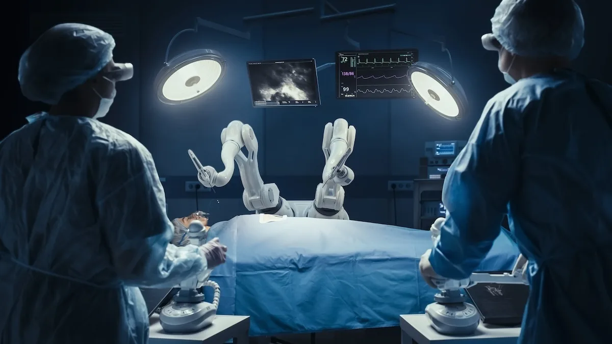 A robotic device performs surgery.