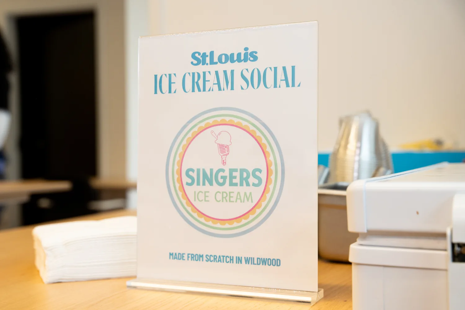 Sign for Singers ice cream social. "made from scratch in wildwood"