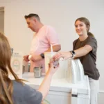 Handing out ice cream at the SLM ice cream social