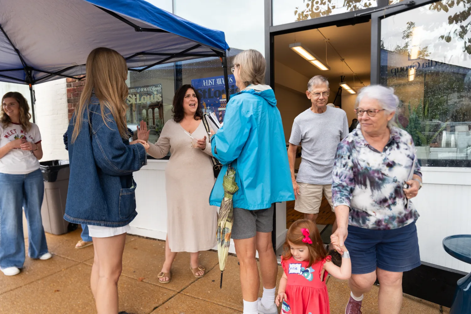 Cheryl Baehr chatting with guests outside the ice cream social