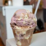 cup of St. Louis Magazine's exclusive spumoni ice cream flavor from Singer's Ice Cream with a spoon in it