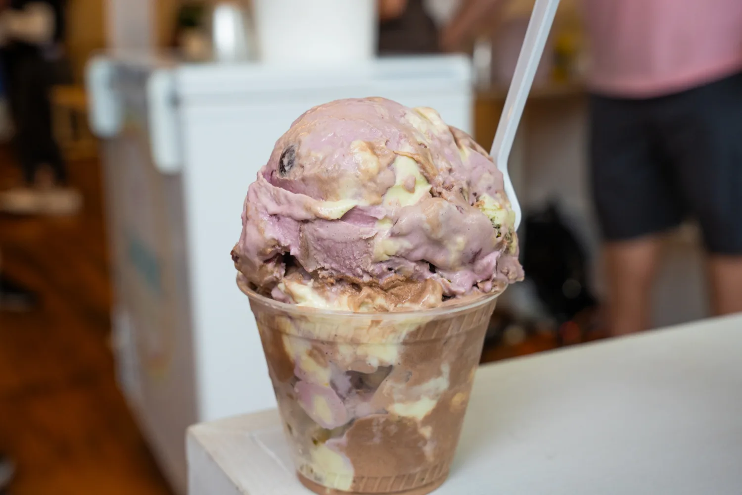 cup of St. Louis Magazine's exclusive spumoni ice cream flavor from Singer's Ice Cream with a spoon in it