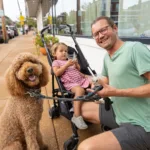 Dog, child and adult at the Ice Cream Social