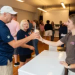 handing ice cream at STL mag Ice Cream Social