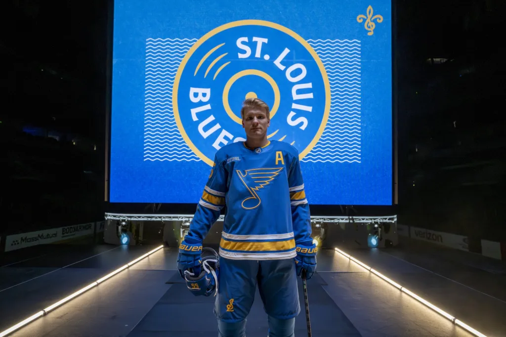 Blues defenseman Colton Parayko poses in the team's new home uniform.
