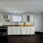 Before photos of Alex and Brandon Eads home on The Hill. What began as a 1,200-square-foot bungalow was transformed into a stunning three-story, 3,000-square-foot dream home rebuilt from the basement up.