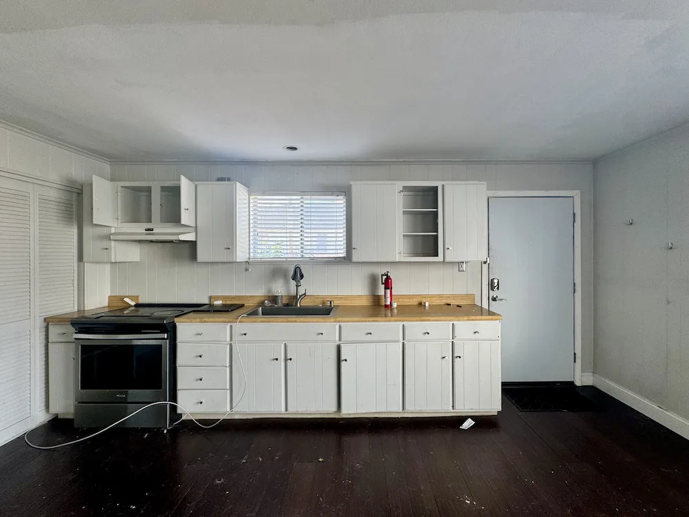 Before photos of Alex and Brandon Eads home on The Hill. What began as a 1,200-square-foot bungalow was transformed into a stunning three-story, 3,000-square-foot dream home rebuilt from the basement up.