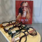 Display of CHROMA eyeglass frames in rich jewel tones at Eyewearhaus.