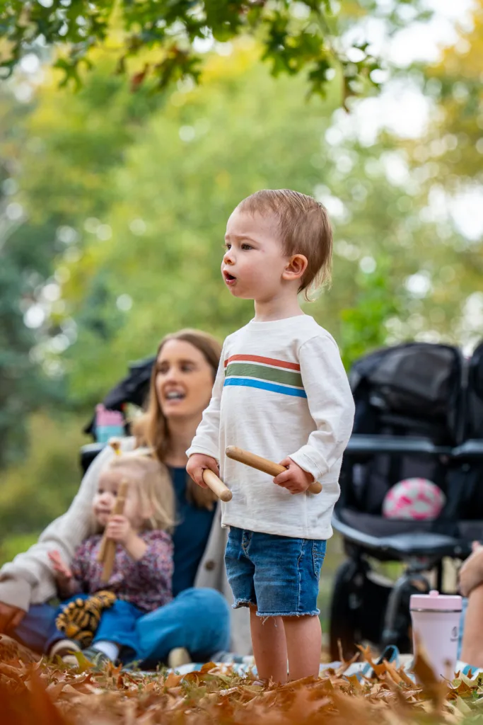 Leo Loveless at Music and Me session, conducted by his father Laren Loveless, in Francis Park in St. Louis, Missouri.