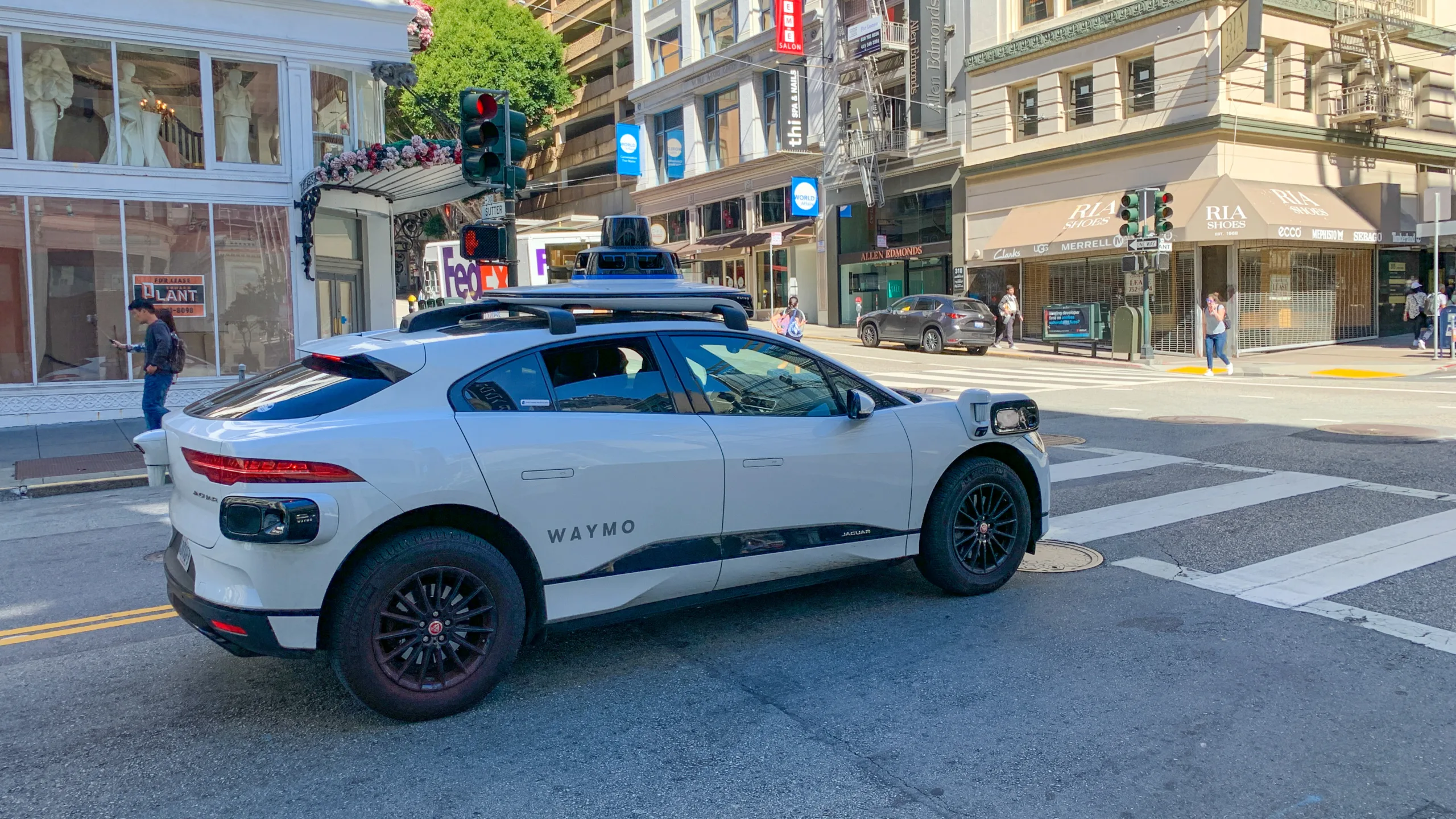 A driverless Waymo taxi.
