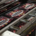 Brown towels on a conveyer belt