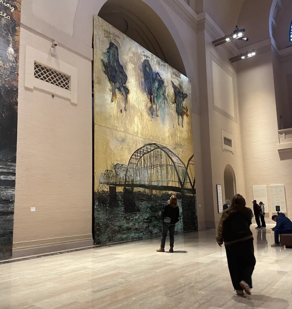 Visitors take in Anselm Kiefer's "Lumpeguin, Cigwe, Animiki" in Sculpture Hall.