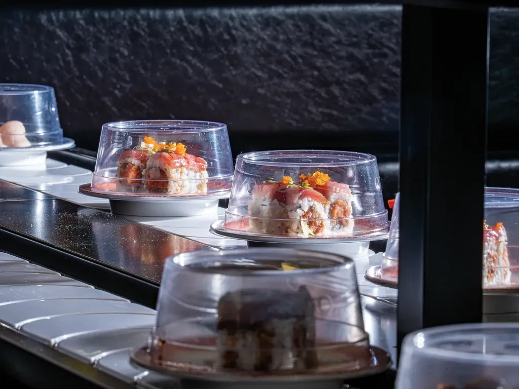 sushi options on the conveyor belt at Sakatanoya