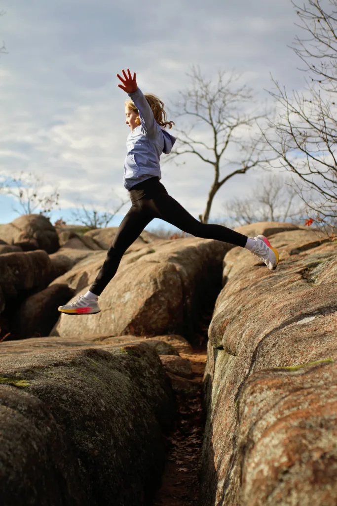 Skipping over boulders at Elephant Rocks State Park