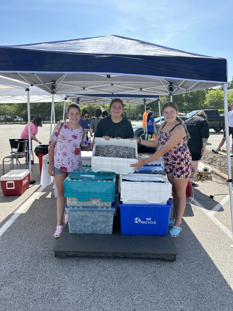 Volunteers collect aluminum pull tabs to benefit Ronald McDonald House Charities of St. Louis.