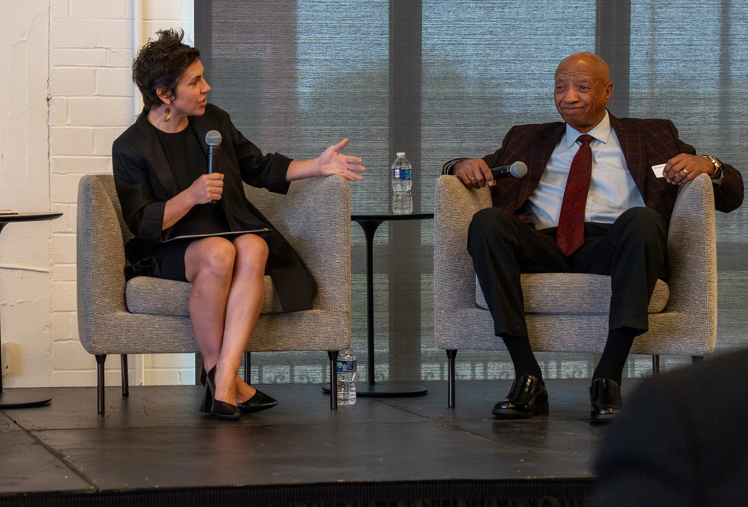 Two people on stage.