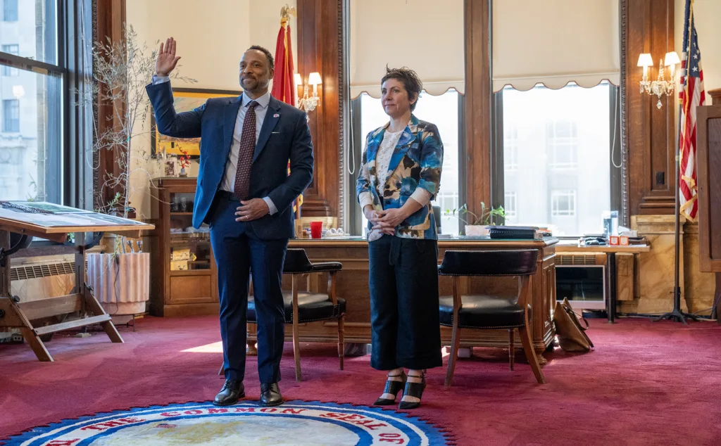 A man swearing the oath.