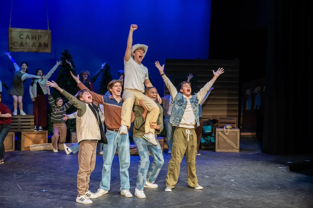 Students take center stage in an energetic camp-themed production at the STAGES Performing Arts Academy.