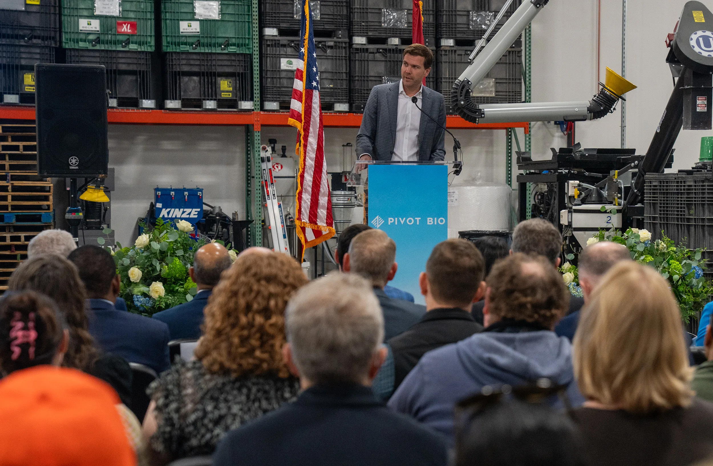A man speaking at a podium.