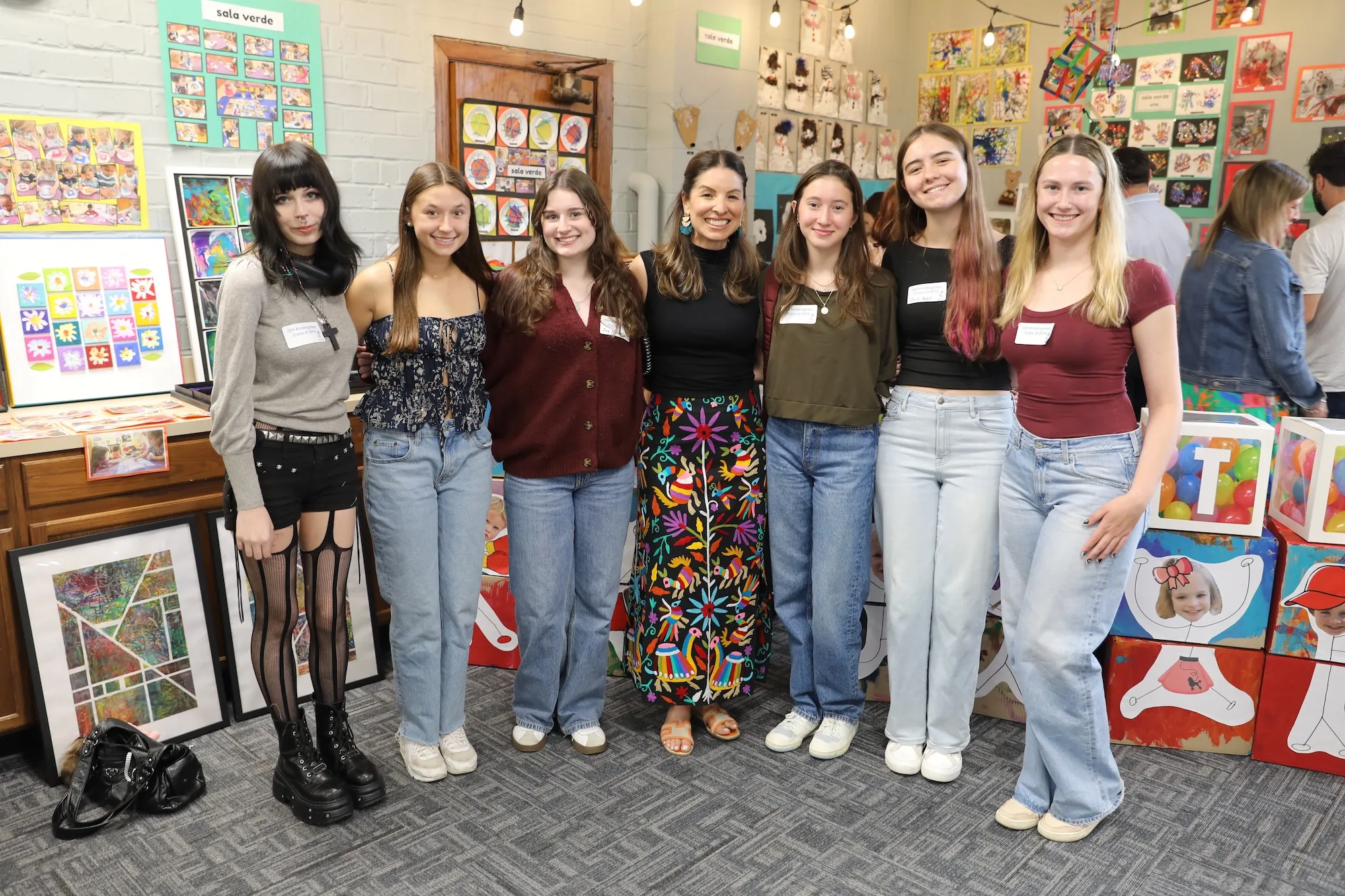 Carolina Diaz-Silva with alumni Ava, Claire, and Lucia