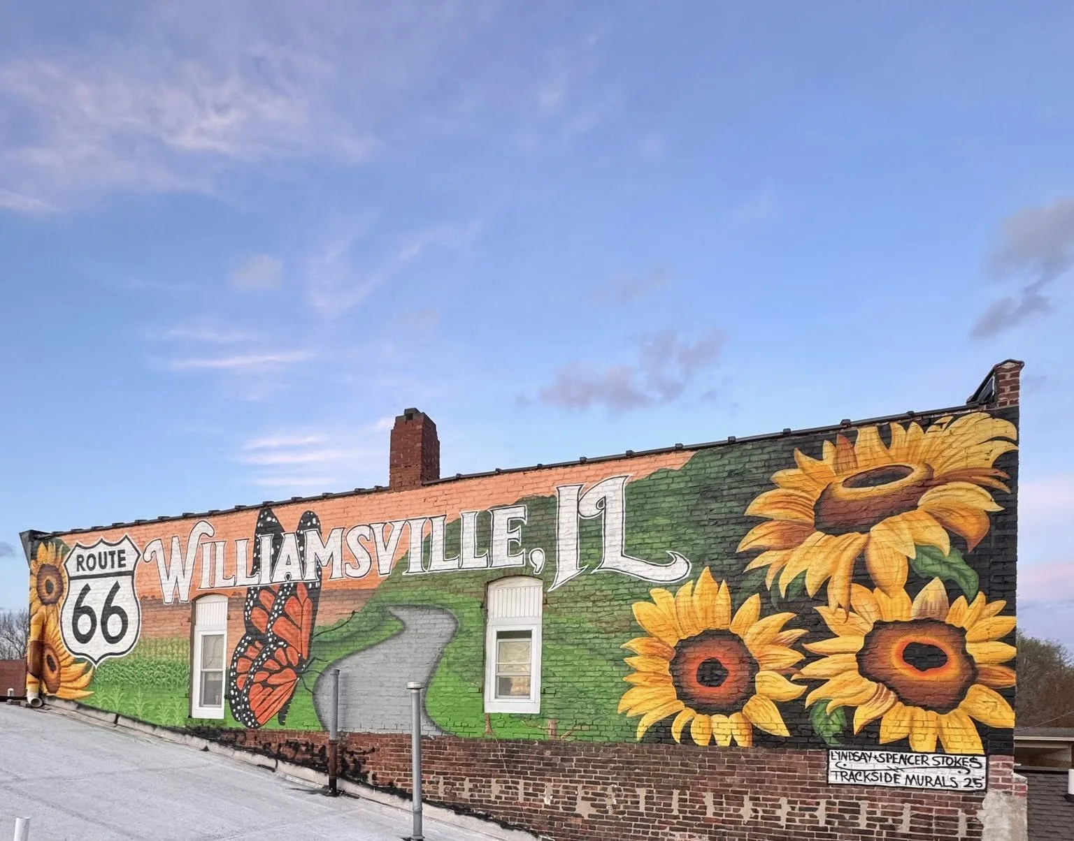 A vibrant mural celebrates Route 66 in Williamsville, Illinois.