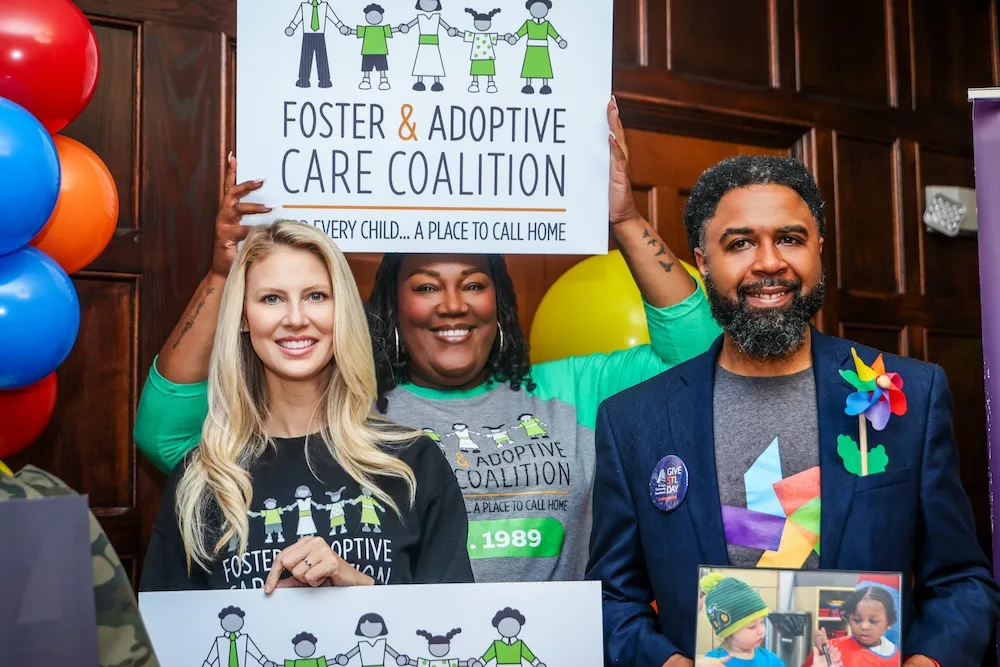 Supporters of the Foster & Adoptive Care Coalition participate in Give STL Day, highlighting the organization’s mission to ensure every child has a place to call home.