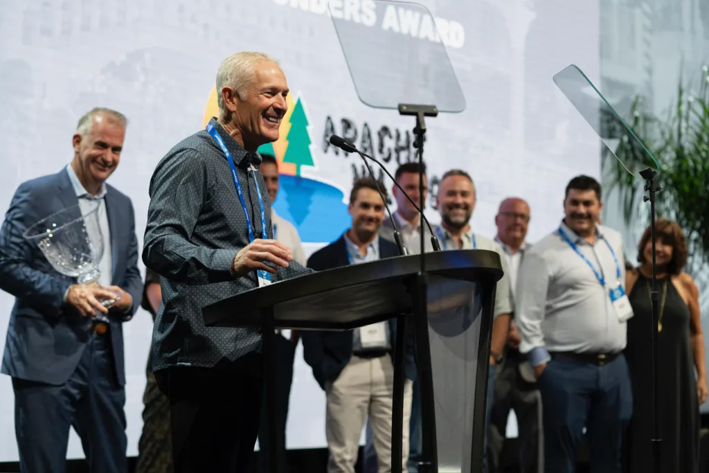 John Meyer, President, accepts the Founders Award from Jayco.