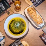 Pane | hearth bread + garlic herb oil + parmigiana + olive + balsamic