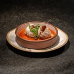 Antipasto Caldo | crispy meatballs + radicchio agrodolce + basil + parmigiana + pomodoro