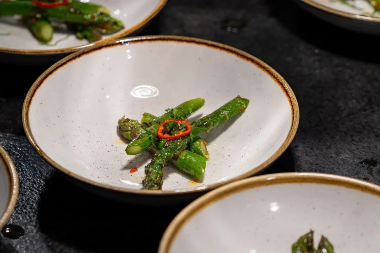 Insalata | wood-grilled asparagus + Fresno chile + lemon + mint + charred shallot