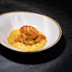 Pesce | seared scallop + saffron risotto + charred tomato