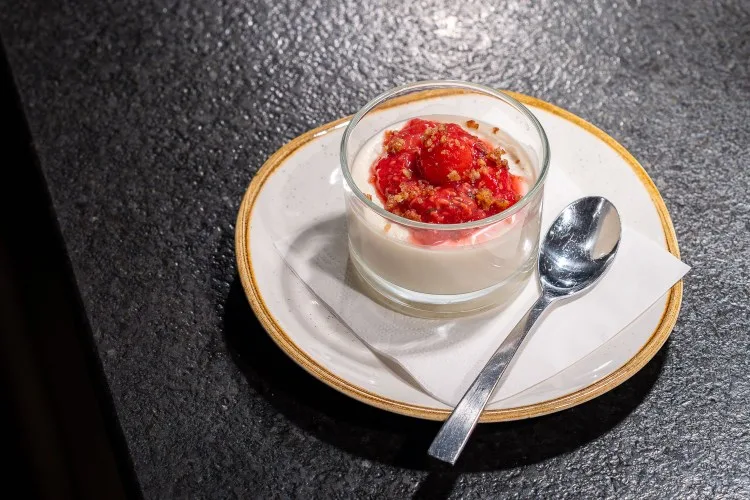 Dolce | brown sugar panna cotta + lavender candied pistachio + raspberry