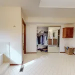 Before: The existing layout included traditional bathroom fixtures and a more straightforward floor plan.
