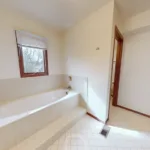 Before: The original bathtub area.