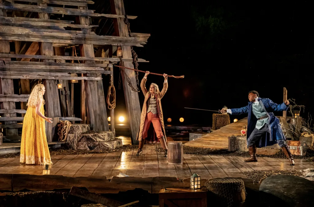 Sigrid Wise (Miranda), Nancy Bell (Prospero), and Zay Williams (Ferdinand) in The St. Louis Shakespeare Festival's production of 'The Tempest.'