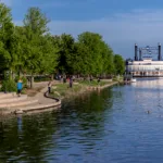 The Fox River waterfront features walking trails, green spaces, and scenic river views.