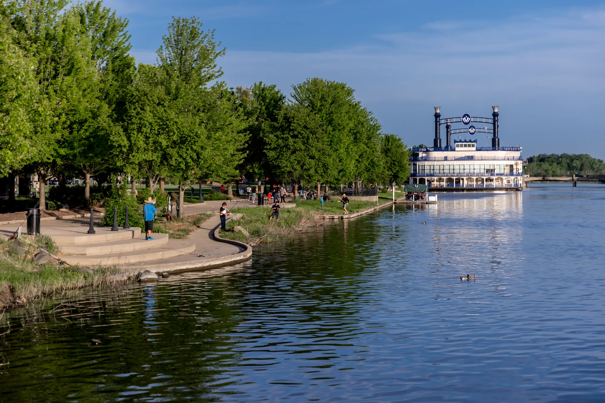 The Fox River waterfront features walking trails, green spaces, and scenic river views.