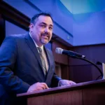 Jarrett Medlin speaking at the Excellence in Nursing Awards
