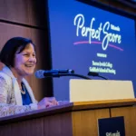 Dr. Bernadette Henrichs, Jack Taylor Dean and Professor at Barnes-Jewish College Goldfarb School of Nursing, presented the Perfect Score Award