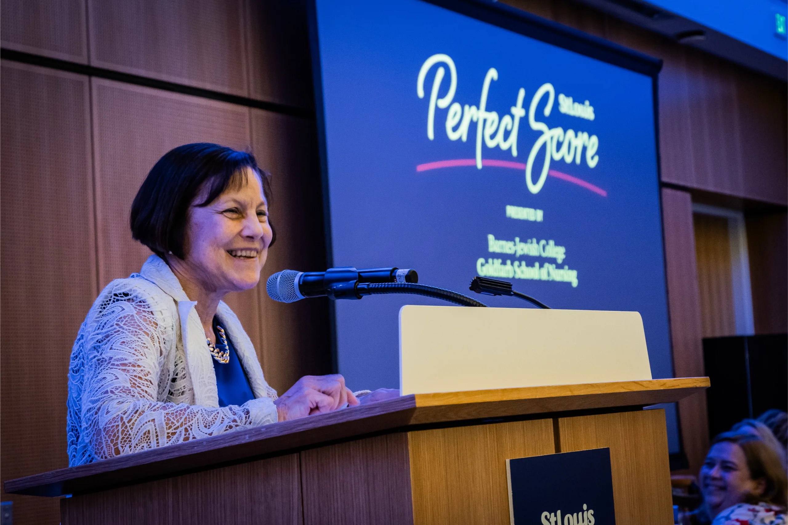 Dr. Bernadette Henrichs, Jack Taylor Dean and Professor at Barnes-Jewish College Goldfarb School of Nursing, presented the Perfect Score Award
